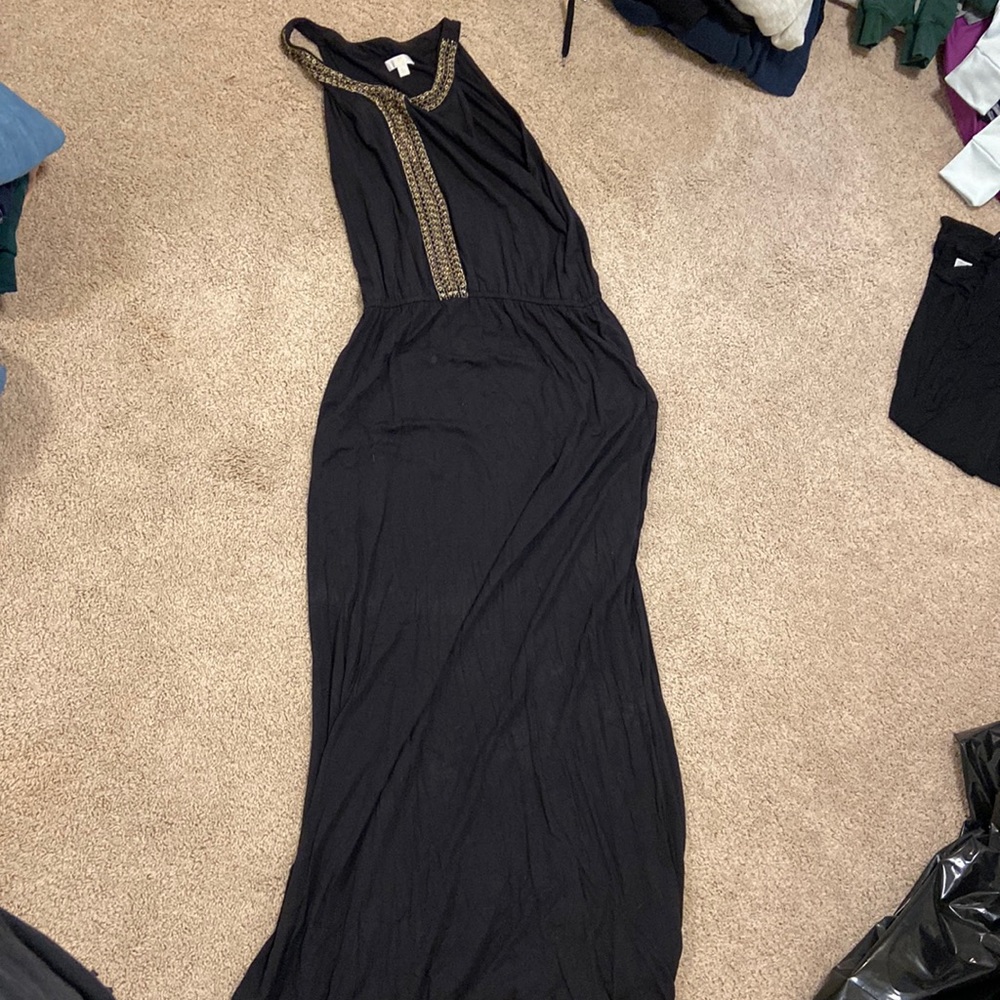 Long gown Fred’s with bead design that are bronze and gold. Size Large